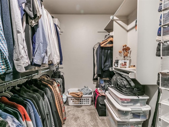 6965 Seabiscuit Ln, Guthrie, OK 73044 - walk in closet featuring carpet floors