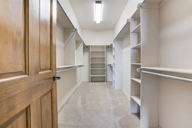 3401 Fox Hill Ter, Edmond, OK 73034 - walk in closet with light carpet
