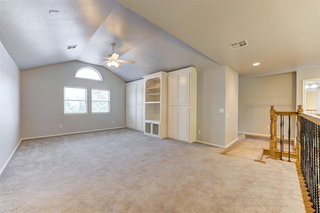 3401 Fox Hill Ter, Edmond, OK 73034 - unfurnished room featuring ceiling fan, lofted ceiling, and light carpet
