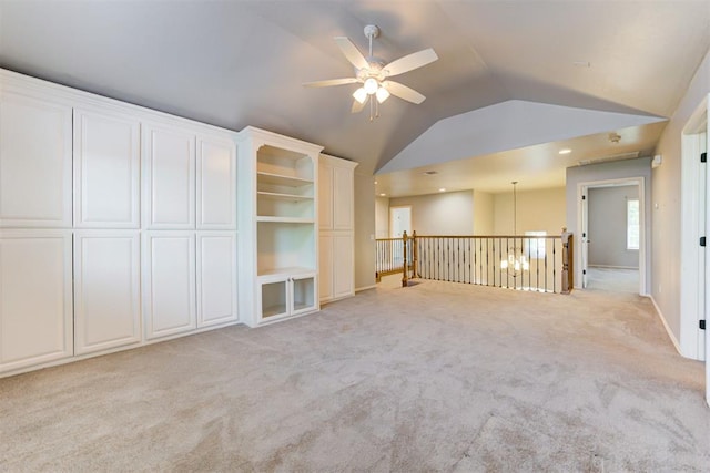 3401 Fox Hill Ter, Edmond, OK 73034 - unfurnished room with lofted ceiling, light colored carpet, and ceiling fan