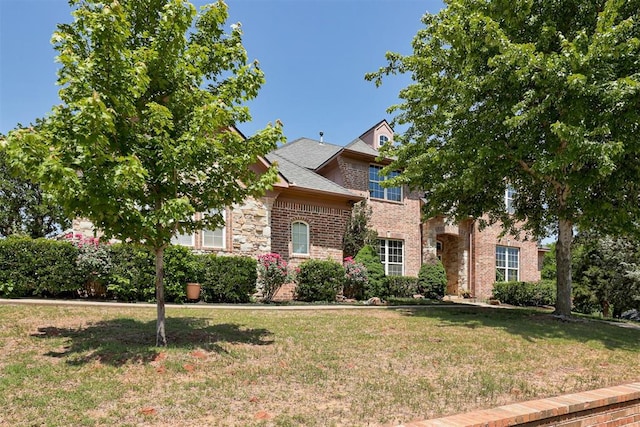 3401 Fox Hill Ter, Edmond, OK 73034 - view of front of home featuring a front lawn and brick siding