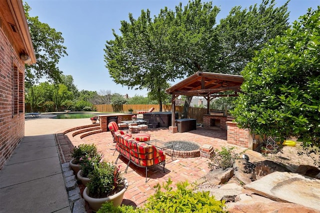 3401 Fox Hill Ter, Edmond, OK 73034 - fenced backyard featuring a gazebo, a hot tub, a patio, and an outdoor pool