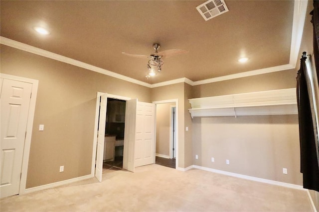 unfurnished bedroom with carpet, crown molding, recessed lighting, baseboards, and a ceiling fan