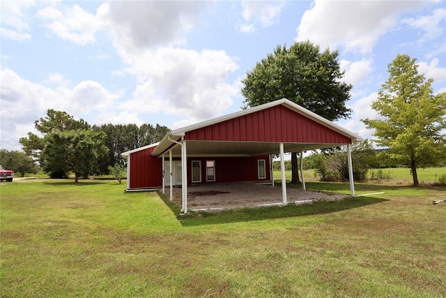 view of outdoor structure with an attached carport