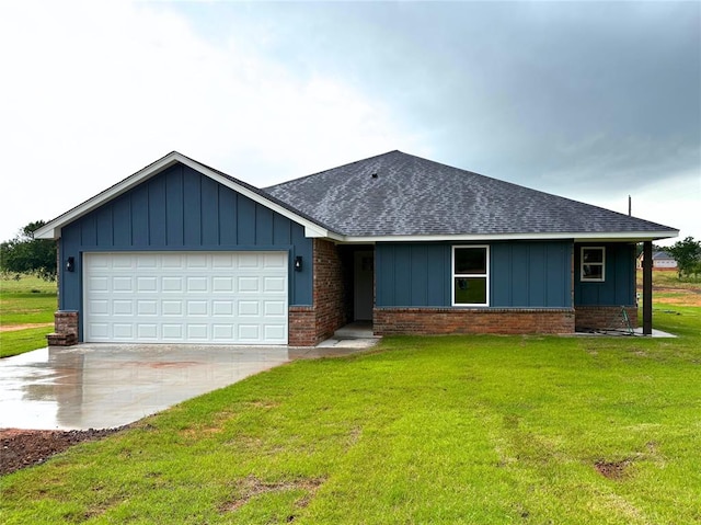 2476 County St Unit 2960, Blanchard, OK 73010 - view of front of property featuring roof with shingles, an attached garage, brick siding, and a front yard