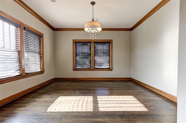 100 S Macomb Ave, El Reno, OK 73036 - empty room with plenty of natural light, wood finished floors, a chandelier, and crown molding