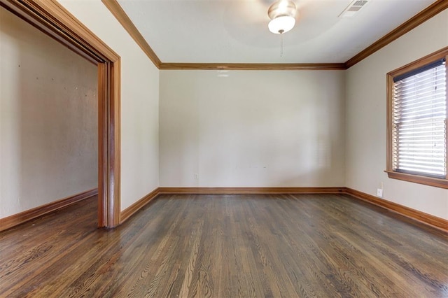 100 S Macomb Ave, El Reno, OK 73036 - spare room featuring wood finished floors, ceiling fan, baseboards, and ornamental molding