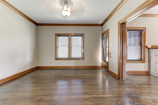100 S Macomb Ave, El Reno, OK 73036 - spare room featuring wood finished floors, ornamental molding, and baseboards