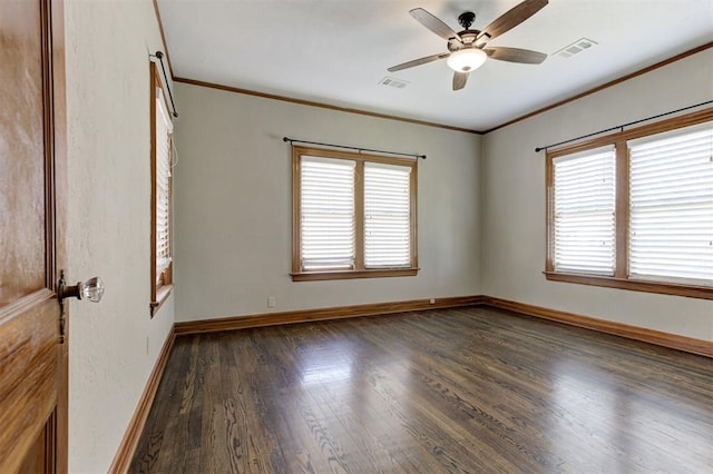 100 S Macomb Ave, El Reno, OK 73036 - empty room with plenty of natural light, ornamental molding, wood finished floors, a ceiling fan, and baseboards