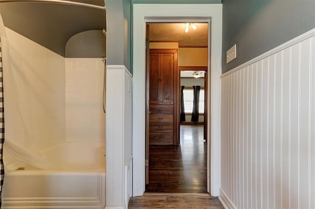 100 S Macomb Ave, El Reno, OK 73036 - bathroom with wood finished floors and shower / bath combination with curtain