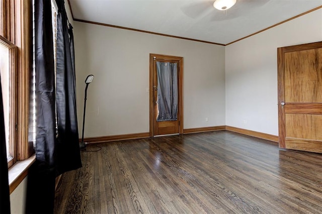100 S Macomb Ave, El Reno, OK 73036 - unfurnished room with ornamental molding, dark wood-type flooring, ceiling fan, and baseboards