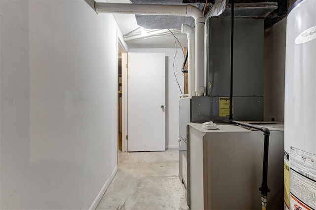 100 S Macomb Ave, El Reno, OK 73036 - utility room featuring water heater and heating unit
