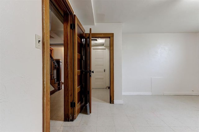 100 S Macomb Ave, El Reno, OK 73036 - corridor featuring stairway and baseboards