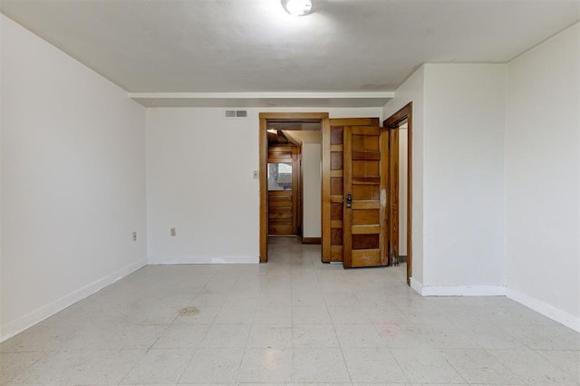 100 S Macomb Ave, El Reno, OK 73036 - spare room with baseboards and light flooring