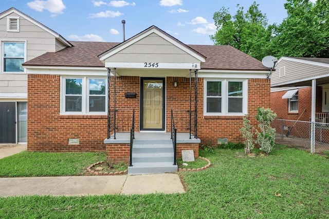 2545 W Eubanks St, Oklahoma City, OK 73112 - bungalow with brick siding, roof with shingles, and crawl space