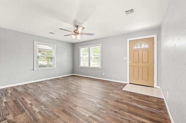 2545 W Eubanks St, Oklahoma City, OK 73112 - foyer featuring wood finished floors, a ceiling fan, and baseboards