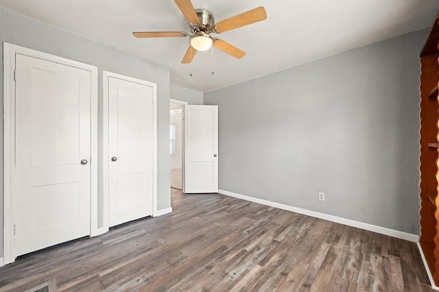 2545 W Eubanks St, Oklahoma City, OK 73112 - unfurnished bedroom featuring wood finished floors, baseboards, a closet, and a ceiling fan