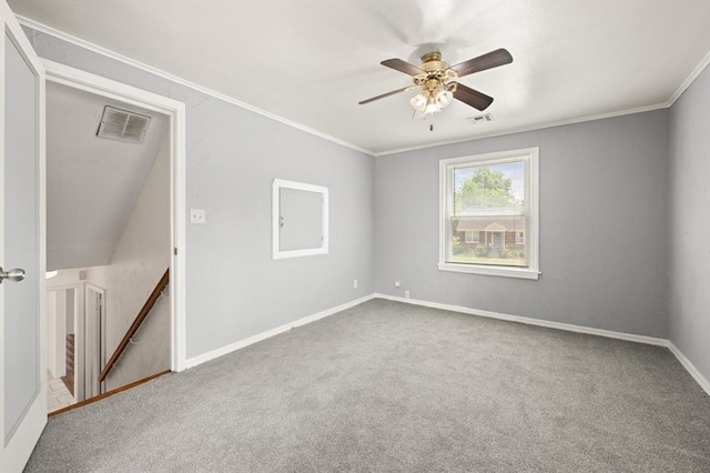 2545 W Eubanks St, Oklahoma City, OK 73112 - carpeted empty room with crown molding, ceiling fan, and baseboards
