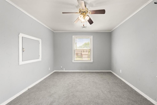 2545 W Eubanks St, Oklahoma City, OK 73112 - empty room with ceiling fan, crown molding, carpet floors, and baseboards