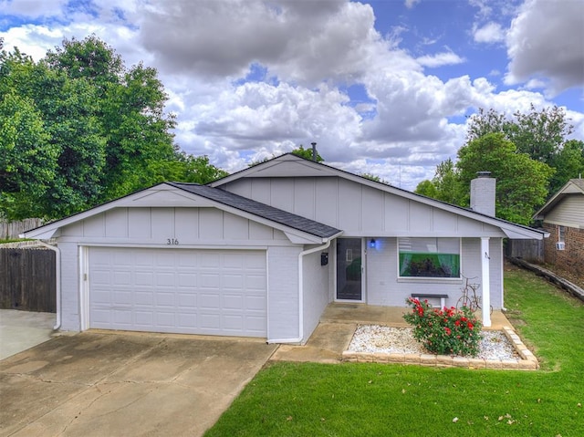 ranch-style home featuring an attached garage, a chimney, board and batten siding, concrete driveway, and brick siding