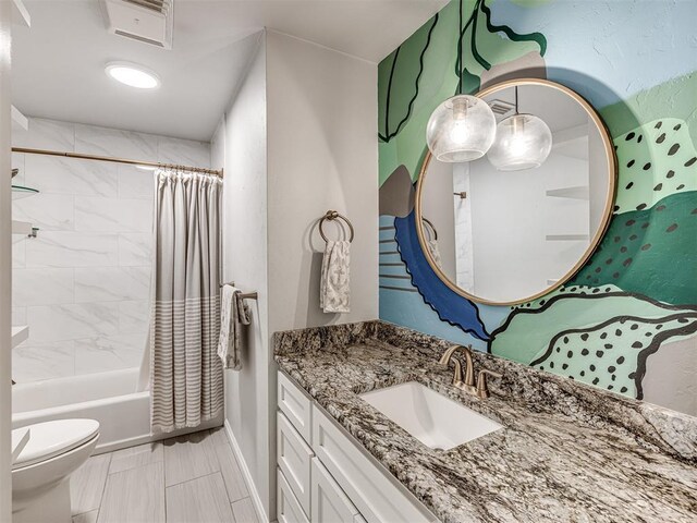 bathroom featuring shower / bath combination with curtain, vanity, toilet, and baseboards