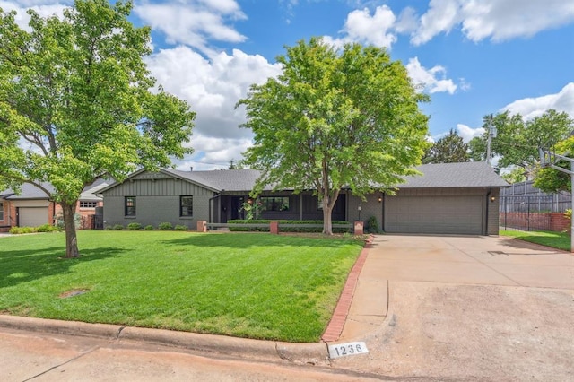 1236 Glenbrook Ter, Nichols Hills, OK 73116 - ranch-style house featuring a garage, driveway, and brick siding