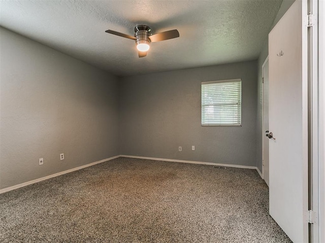 2916 Prairie Rose Ct, Oklahoma City, OK 73120 - carpeted spare room featuring ceiling fan, a textured ceiling, and baseboards