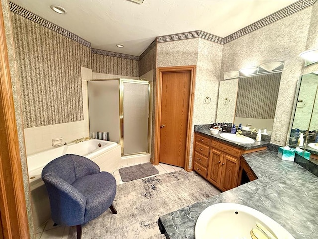 bathroom featuring wallpapered walls, a shower stall, a garden tub, vanity, and ornamental molding
