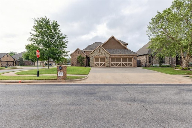 19724 Meadow Bend Ave, Edmond, OK 73012 - craftsman house featuring an attached garage, a front yard, concrete driveway, stone siding, and a shingled roof