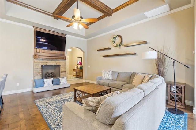 19724 Meadow Bend Ave, Edmond, OK 73012 - living area featuring arched walkways, coffered ceiling, hardwood / wood-style flooring, baseboards, and ceiling fan