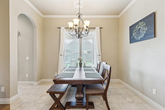 19724 Meadow Bend Ave, Edmond, OK 73012 - dining room featuring a chandelier, healthy amount of natural light, arched walkways, crown molding, and light tile patterned flooring