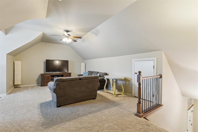 19724 Meadow Bend Ave, Edmond, OK 73012 - carpeted living area featuring a ceiling fan, lofted ceiling, and baseboards