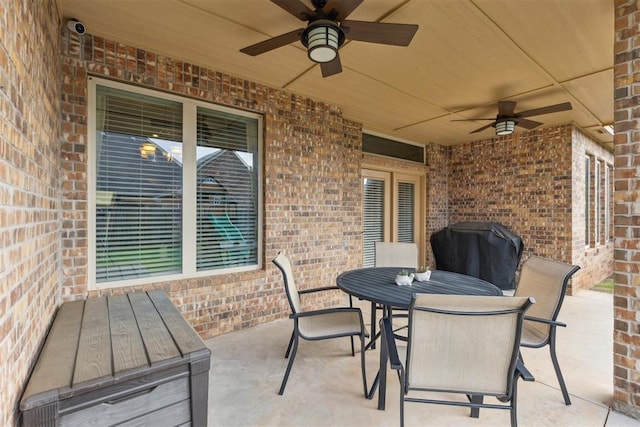 19724 Meadow Bend Ave, Edmond, OK 73012 - view of patio / terrace featuring a ceiling fan and outdoor dining space