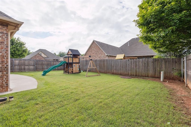 19724 Meadow Bend Ave, Edmond, OK 73012 - view of yard with a playground