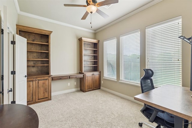 19724 Meadow Bend Ave, Edmond, OK 73012 - office space with ceiling fan, crown molding, light colored carpet, and baseboards