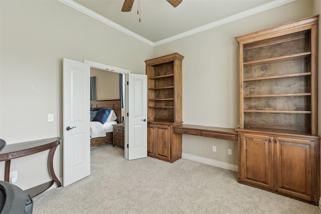 19724 Meadow Bend Ave, Edmond, OK 73012 - unfurnished office featuring crown molding, light carpet, a ceiling fan, and baseboards