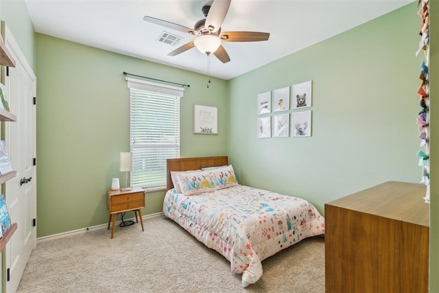 19724 Meadow Bend Ave, Edmond, OK 73012 - bedroom with carpet, ceiling fan, and baseboards