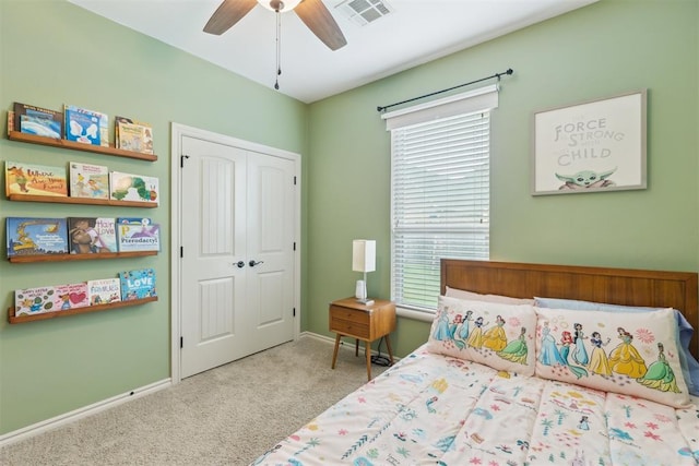 19724 Meadow Bend Ave, Edmond, OK 73012 - bedroom with carpet floors, multiple windows, baseboards, and a closet