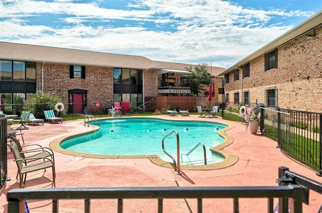 2525 NW 62nd St Unit 208, Oklahoma City, OK 73112 - community pool featuring a patio area