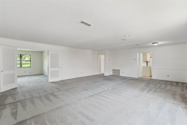 2525 NW 62nd St Unit 208, Oklahoma City, OK 73112 - carpeted spare room with recessed lighting