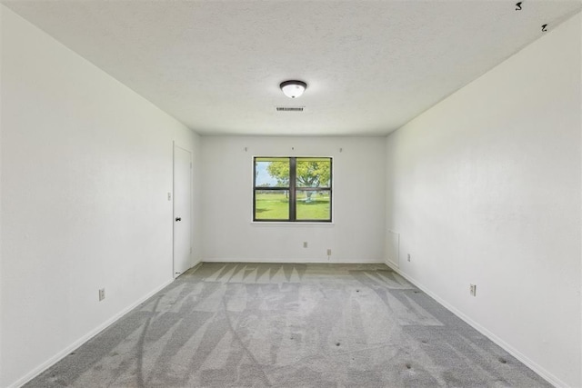 2525 NW 62nd St Unit 208, Oklahoma City, OK 73112 - empty room with light carpet and baseboards