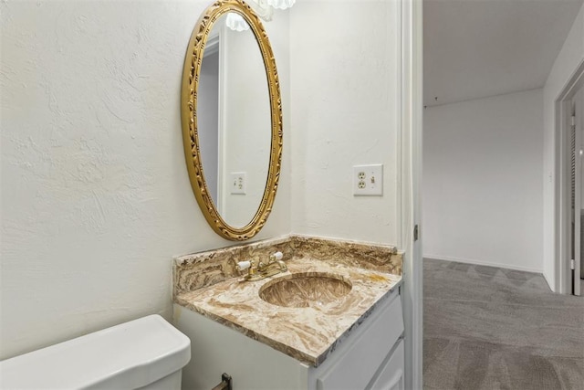 2525 NW 62nd St Unit 208, Oklahoma City, OK 73112 - bathroom with vanity and toilet