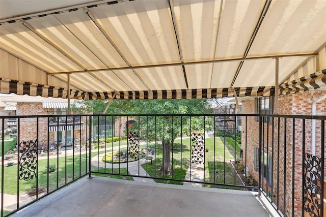 2525 NW 62nd St Unit 208, Oklahoma City, OK 73112 - view of patio / terrace with a balcony