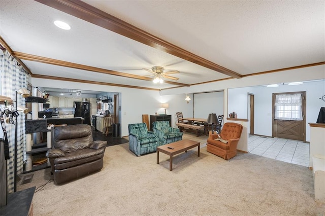 9801 Lancet Ln, Oklahoma City, OK 73120 - carpeted living area with crown molding, ceiling fan, a textured ceiling, and tile patterned floors