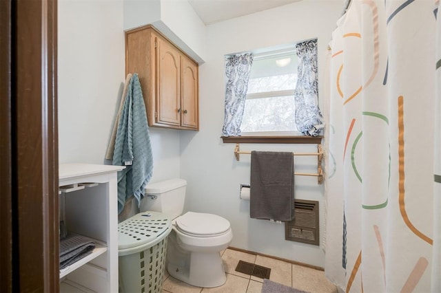 9801 Lancet Ln, Oklahoma City, OK 73120 - bathroom with toilet and tile patterned flooring