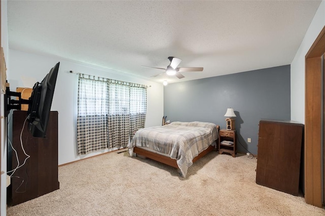 9801 Lancet Ln, Oklahoma City, OK 73120 - carpeted bedroom with a ceiling fan and a textured ceiling