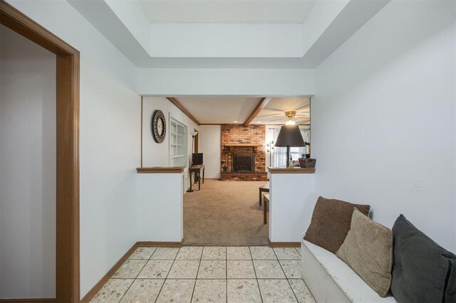 9801 Lancet Ln, Oklahoma City, OK 73120 - corridor featuring light colored carpet, a raised ceiling, and light floors