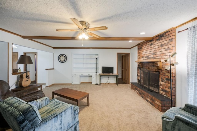 9801 Lancet Ln, Oklahoma City, OK 73120 - carpeted living room featuring a textured ceiling, a fireplace, ceiling fan, and crown molding