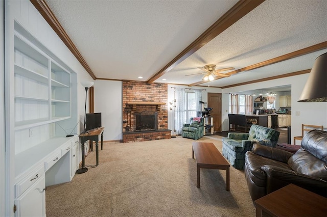 9801 Lancet Ln, Oklahoma City, OK 73120 - living area with a textured ceiling, ornamental molding, light colored carpet, a fireplace, and ceiling fan