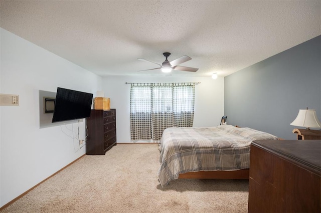 9801 Lancet Ln, Oklahoma City, OK 73120 - bedroom featuring carpet floors, a textured ceiling, and ceiling fan